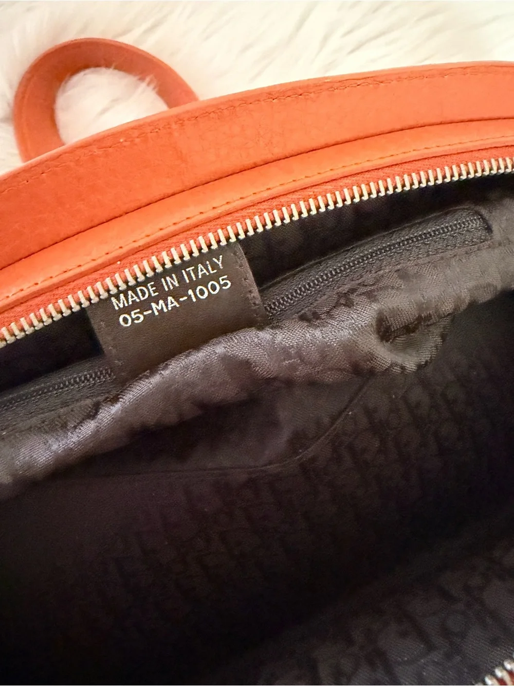 Dior Limited Edition Orange Leather Top-Handle Bag.